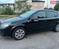Черный Опель Астра, объемом двигателя 1.8 л и пробегом 207 тыс. км за 4950 $, фото 45 на Automoto.ua
