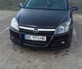Черный Опель Астра, объемом двигателя 1.8 л и пробегом 210 тыс. км за 5300 $, фото 1 на Automoto.ua