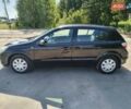 Черный Опель Астра, объемом двигателя 1.4 л и пробегом 176 тыс. км за 4000 $, фото 3 на Automoto.ua