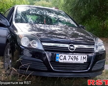 Черный Опель Астра, объемом двигателя 1.4 л и пробегом 203 тыс. км за 4800 $, фото 4 на Automoto.ua