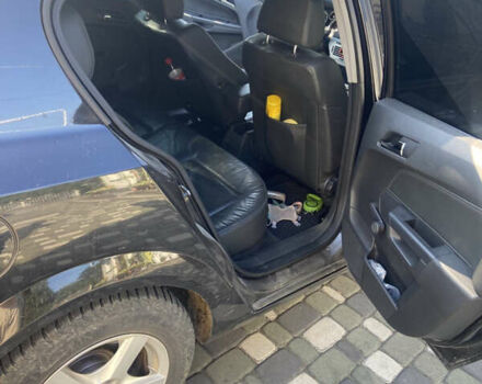 Черный Опель Астра, объемом двигателя 1.6 л и пробегом 222 тыс. км за 5500 $, фото 4 на Automoto.ua