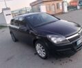 Черный Опель Астра, объемом двигателя 1.6 л и пробегом 230 тыс. км за 4400 $, фото 1 на Automoto.ua