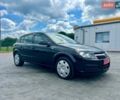Черный Опель Астра, объемом двигателя 1.6 л и пробегом 157 тыс. км за 4999 $, фото 1 на Automoto.ua