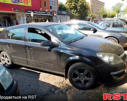 Черный Опель Астра, объемом двигателя 1.4 л и пробегом 203 тыс. км за 4800 $, фото 6 на Automoto.ua