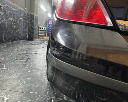 Черный Опель Астра, объемом двигателя 1.4 л и пробегом 220 тыс. км за 4700 $, фото 3 на Automoto.ua