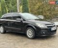 Черный Опель Астра, объемом двигателя 1.4 л и пробегом 274 тыс. км за 3777 $, фото 7 на Automoto.ua