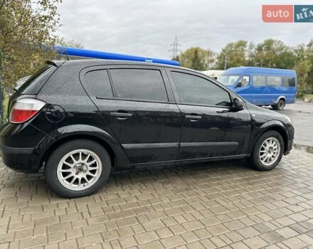 Черный Опель Астра, объемом двигателя 1.4 л и пробегом 274 тыс. км за 3777 $, фото 10 на Automoto.ua