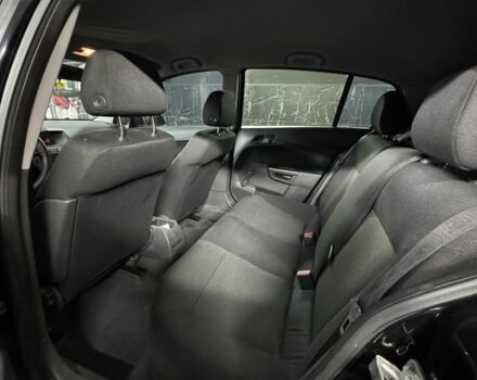 Черный Опель Астра, объемом двигателя 1.4 л и пробегом 220 тыс. км за 4500 $, фото 2 на Automoto.ua