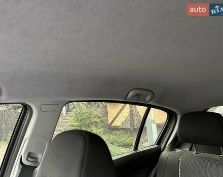 Черный Опель Астра, объемом двигателя 1.4 л и пробегом 274 тыс. км за 3777 $, фото 23 на Automoto.ua