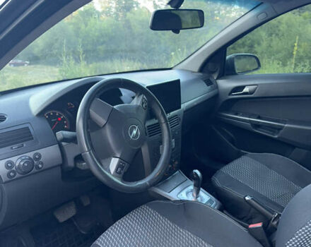 Черный Опель Астра, объемом двигателя 1.6 л и пробегом 207 тыс. км за 4200 $, фото 7 на Automoto.ua