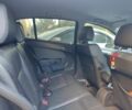 Черный Опель Астра, объемом двигателя 1.9 л и пробегом 180 тыс. км за 5650 $, фото 4 на Automoto.ua