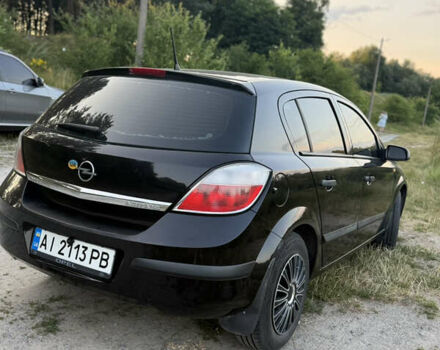 Черный Опель Астра, объемом двигателя 1.6 л и пробегом 207 тыс. км за 4200 $, фото 4 на Automoto.ua