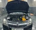Черный Опель Астра, объемом двигателя 1.4 л и пробегом 219 тыс. км за 5000 $, фото 11 на Automoto.ua