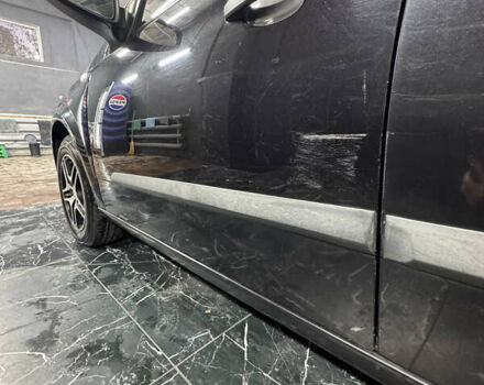 Черный Опель Астра, объемом двигателя 1.4 л и пробегом 220 тыс. км за 4700 $, фото 1 на Automoto.ua