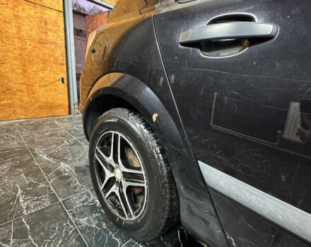 Черный Опель Астра, объемом двигателя 1.4 л и пробегом 220 тыс. км за 4700 $, фото 6 на Automoto.ua