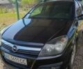Черный Опель Астра, объемом двигателя 1.6 л и пробегом 245 тыс. км за 4950 $, фото 1 на Automoto.ua