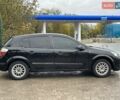 Черный Опель Астра, объемом двигателя 1.4 л и пробегом 274 тыс. км за 3777 $, фото 5 на Automoto.ua