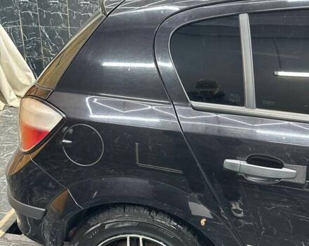 Черный Опель Астра, объемом двигателя 1.4 л и пробегом 219 тыс. км за 5000 $, фото 1 на Automoto.ua