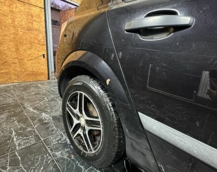 Черный Опель Астра, объемом двигателя 1.4 л и пробегом 220 тыс. км за 4500 $, фото 3 на Automoto.ua