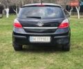 Черный Опель Астра, объемом двигателя 1.4 л и пробегом 210 тыс. км за 5200 $, фото 5 на Automoto.ua
