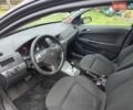 Черный Опель Астра, объемом двигателя 1.4 л и пробегом 210 тыс. км за 5200 $, фото 7 на Automoto.ua