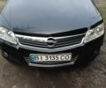 Черный Опель Астра, объемом двигателя 1.6 л и пробегом 250 тыс. км за 5600 $, фото 1 на Automoto.ua