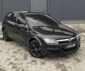 Черный Опель Астра, объемом двигателя 1.4 л и пробегом 155 тыс. км за 3950 $, фото 1 на Automoto.ua