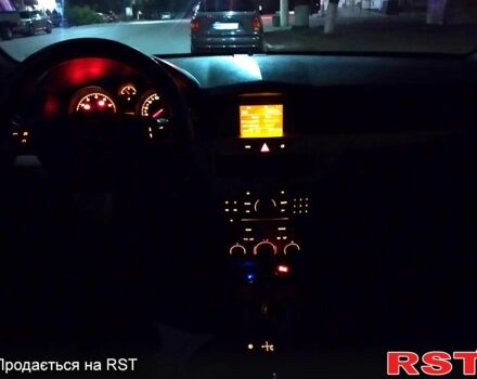 Черный Опель Астра, объемом двигателя 1.6 л и пробегом 200 тыс. км за 4999 $, фото 3 на Automoto.ua