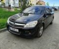Черный Опель Астра, объемом двигателя 1.6 л и пробегом 143 тыс. км за 6147 $, фото 1 на Automoto.ua