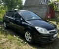 Черный Опель Астра, объемом двигателя 1.8 л и пробегом 155 тыс. км за 5900 $, фото 1 на Automoto.ua