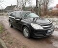 Черный Опель Астра, объемом двигателя 1.4 л и пробегом 148 тыс. км за 4580 $, фото 1 на Automoto.ua