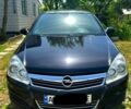 Черный Опель Астра, объемом двигателя 1.8 л и пробегом 155 тыс. км за 5900 $, фото 2 на Automoto.ua