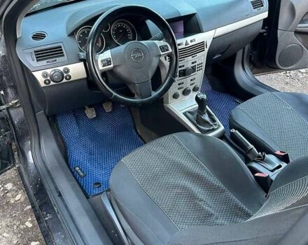 Черный Опель Астра, объемом двигателя 1.3 л и пробегом 227 тыс. км за 4600 $, фото 22 на Automoto.ua