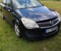 Черный Опель Астра, объемом двигателя 1.2 л и пробегом 250 тыс. км за 3510 $, фото 1 на Automoto.ua