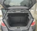 Черный Опель Астра, объемом двигателя 1.4 л и пробегом 159 тыс. км за 4399 $, фото 5 на Automoto.ua
