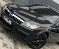 Черный Опель Астра, объемом двигателя 1.4 л и пробегом 155 тыс. км за 3950 $, фото 2 на Automoto.ua
