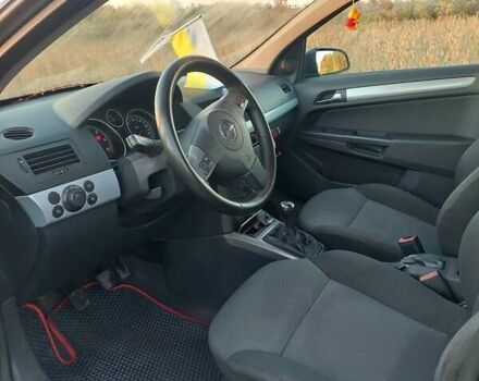 Черный Опель Астра, объемом двигателя 1.25 л и пробегом 268 тыс. км за 5000 $, фото 2 на Automoto.ua