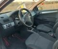 Черный Опель Астра, объемом двигателя 1.25 л и пробегом 268 тыс. км за 5000 $, фото 2 на Automoto.ua
