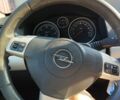 Черный Опель Астра, объемом двигателя 1.2 л и пробегом 250 тыс. км за 3510 $, фото 1 на Automoto.ua