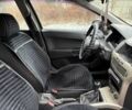 Черный Опель Астра, объемом двигателя 1.4 л и пробегом 148 тыс. км за 4580 $, фото 10 на Automoto.ua