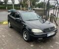Черный Опель Астра, объемом двигателя 1.4 л и пробегом 175 тыс. км за 3300 $, фото 1 на Automoto.ua