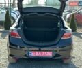 Черный Опель Астра, объемом двигателя 1.4 л и пробегом 189 тыс. км за 5000 $, фото 40 на Automoto.ua