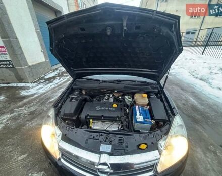 Черный Опель Астра, объемом двигателя 1.6 л и пробегом 247 тыс. км за 4499 $, фото 28 на Automoto.ua