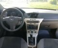Черный Опель Астра, объемом двигателя 1 л и пробегом 215 тыс. км за 4414 $, фото 6 на Automoto.ua