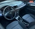 Черный Опель Астра, объемом двигателя 1.3 л и пробегом 190 тыс. км за 3550 $, фото 6 на Automoto.ua