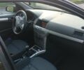 Черный Опель Астра, объемом двигателя 1.6 л и пробегом 203 тыс. км за 5850 $, фото 2 на Automoto.ua