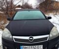 Черный Опель Астра, объемом двигателя 1.6 л и пробегом 200 тыс. км за 4999 $, фото 1 на Automoto.ua