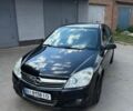Черный Опель Астра, объемом двигателя 1.4 л и пробегом 218 тыс. км за 3800 $, фото 1 на Automoto.ua
