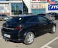 Черный Опель Астра, объемом двигателя 1.25 л и пробегом 265 тыс. км за 5000 $, фото 2 на Automoto.ua