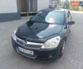 Черный Опель Астра, объемом двигателя 1.69 л и пробегом 255 тыс. км за 4999 $, фото 1 на Automoto.ua